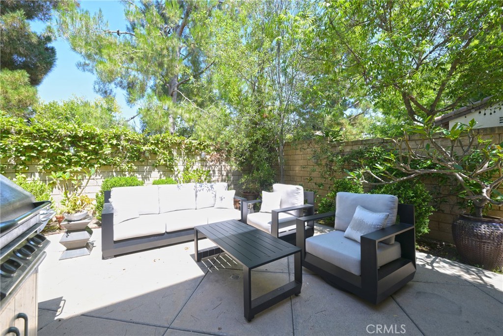 45 Coriander Irvine, CA 92603 - Photo 64 of 64 a outdoor living space with furniture and garden view