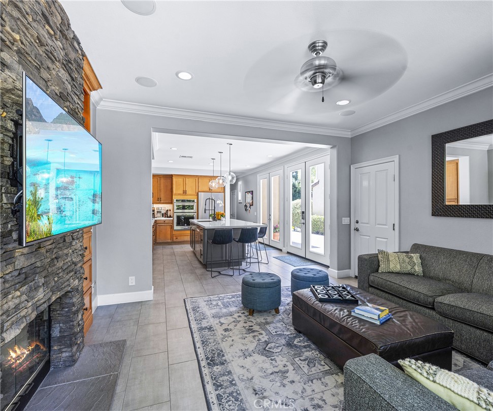 45 Coriander Irvine, CA 92603 - Photo 8 of 64 a living room with furniture and a fireplace