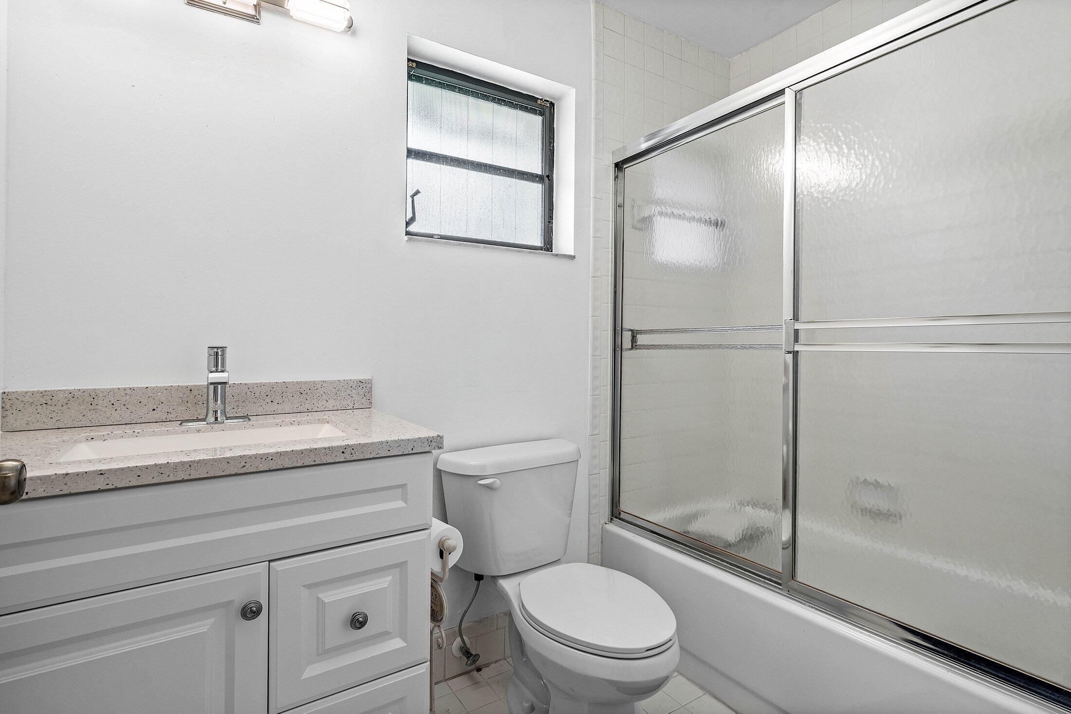 8302 Summersong Terrace, Unit A Boca Raton, FL 33496 - Photo 14 of 43 GUEST BATHROOM