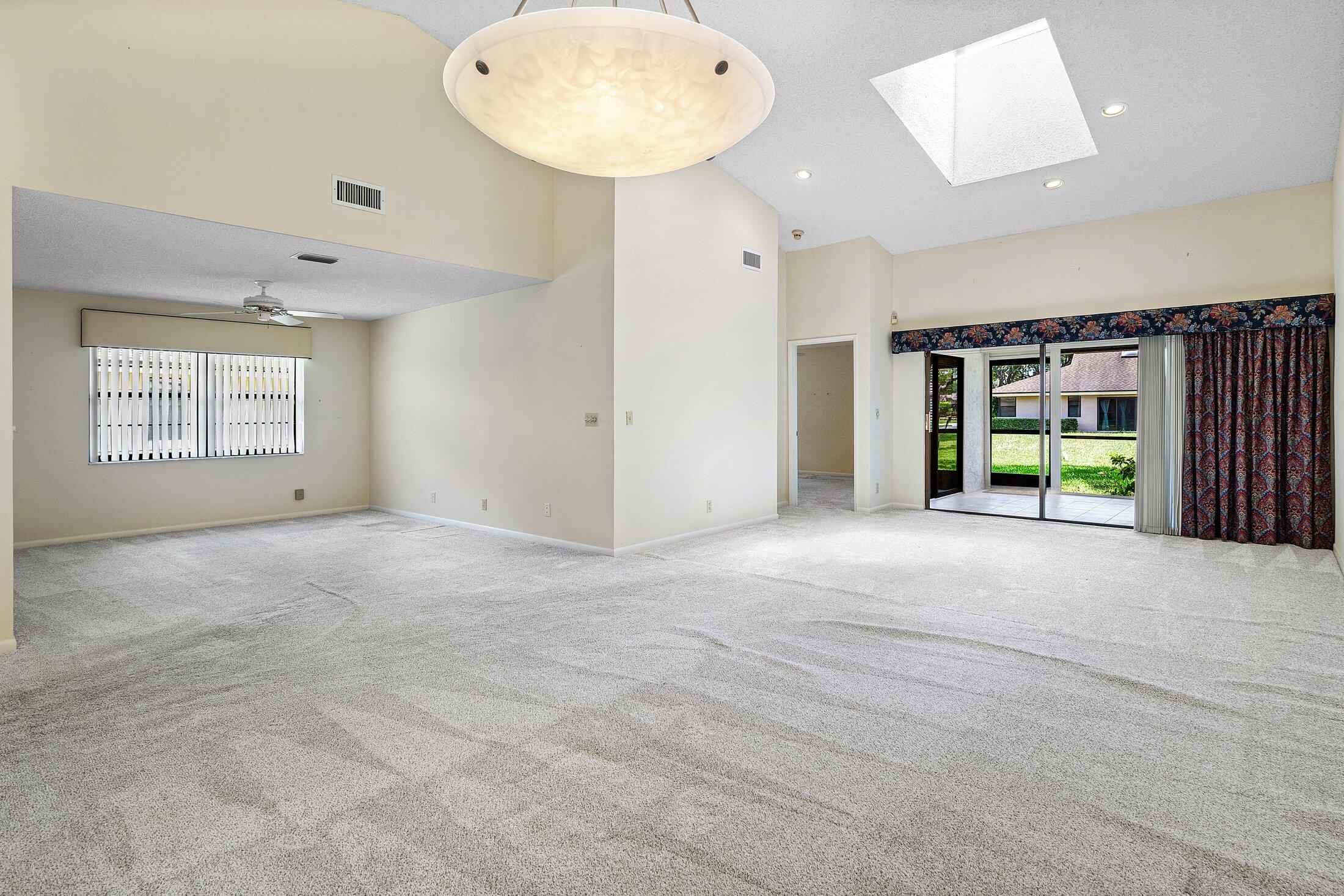 8302 Summersong Terrace, Unit A Boca Raton, FL 33496 - Photo 17 of 43 LIVING ROOM & DEN