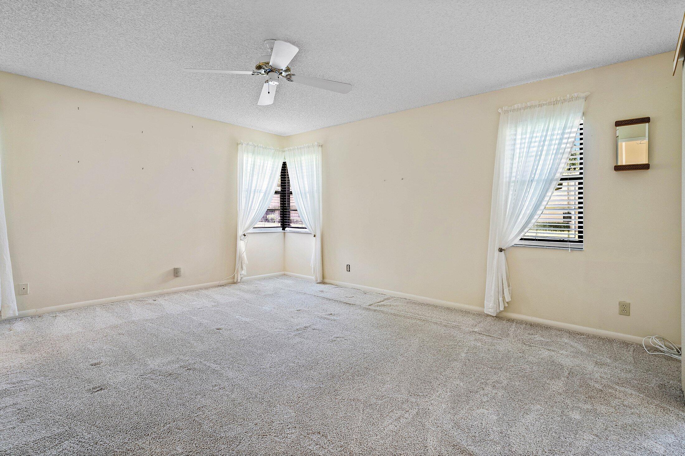 8302 Summersong Terrace, Unit A Boca Raton, FL 33496 - Photo 20 of 43 PRIMARY BEDROOM