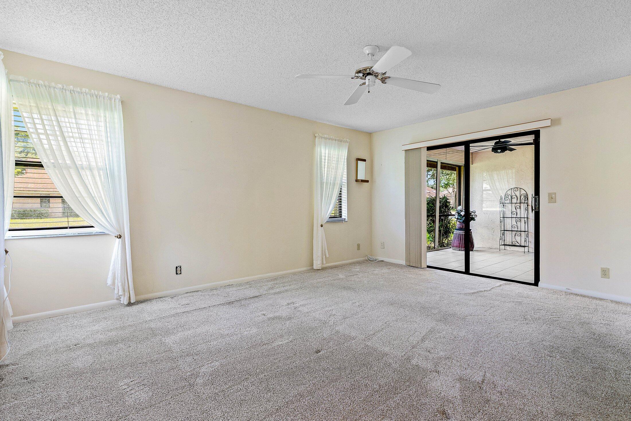 8302 Summersong Terrace, Unit A Boca Raton, FL 33496 - Photo 21 of 43 PRIMARY BEDROOM