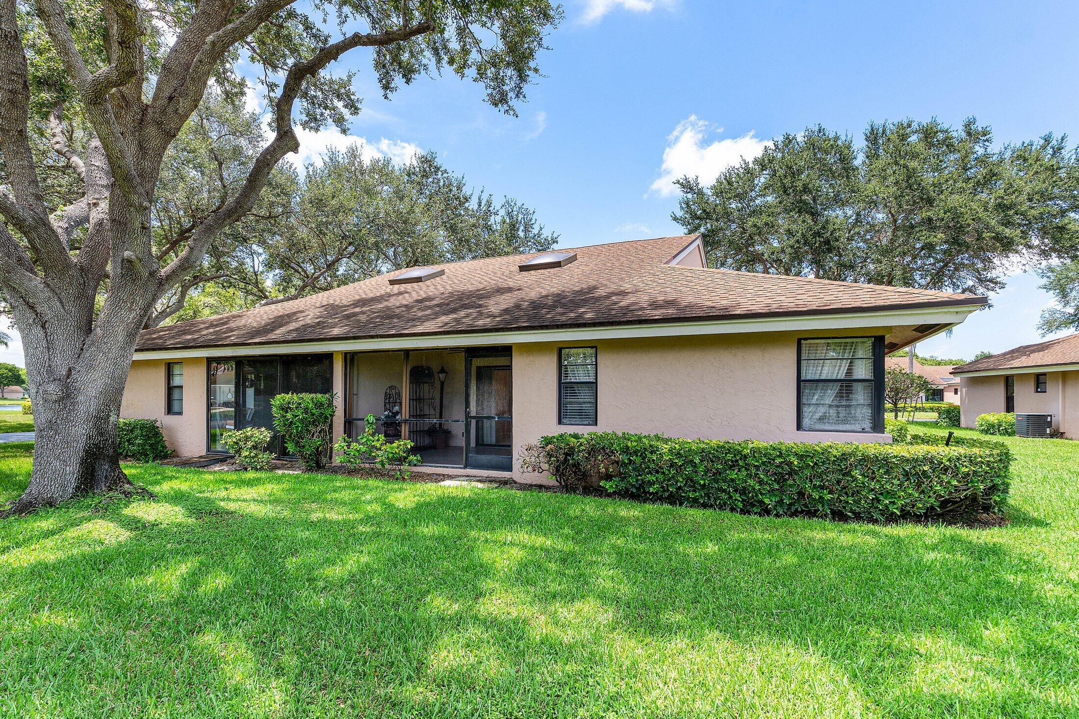 8302 Summersong Terrace, Unit A Boca Raton, FL 33496 - Photo 27 of 43 BACK GARDEN VIEW