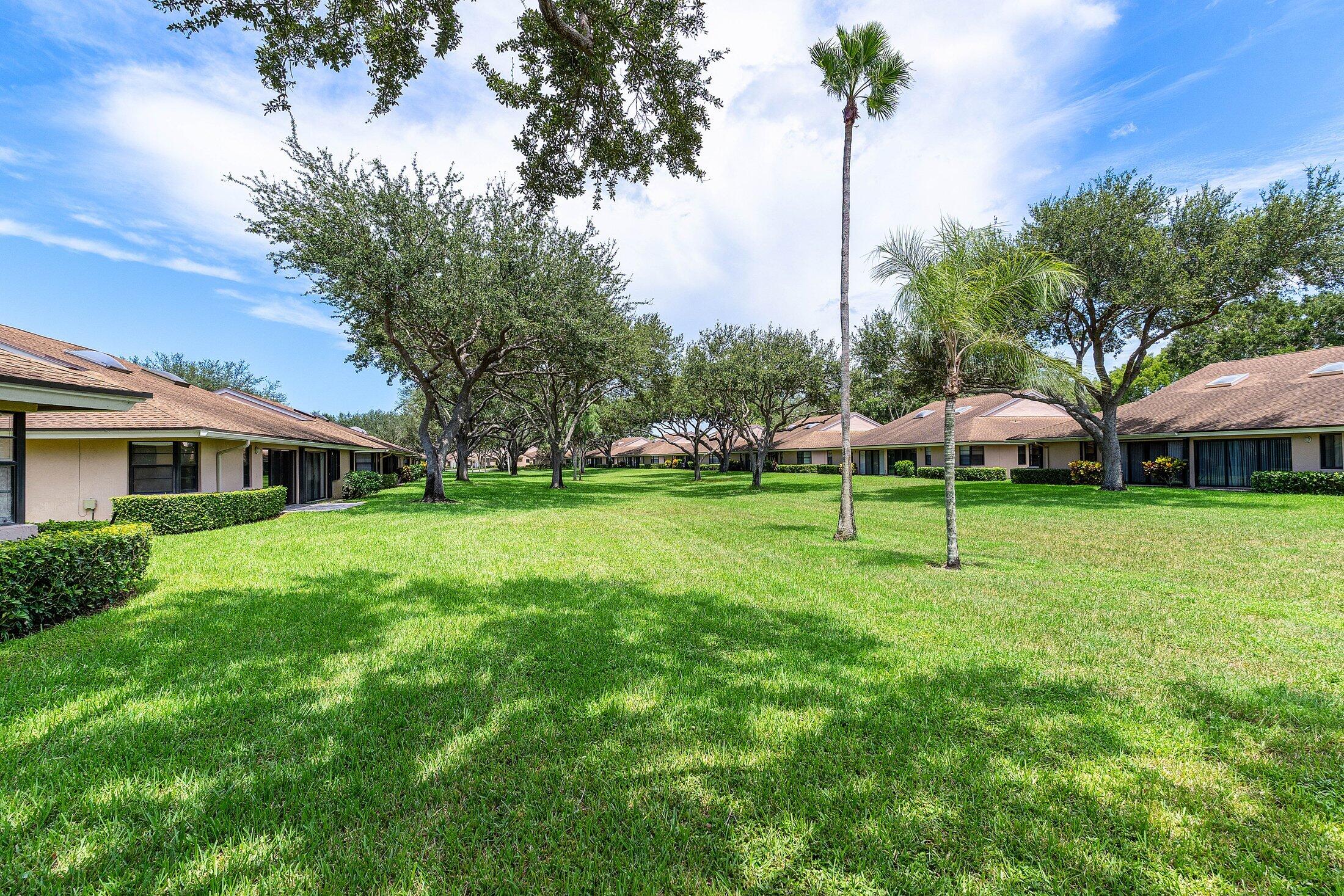 8302 Summersong Terrace, Unit A Boca Raton, FL 33496 - Photo 28 of 43 BACK GARDEN VIEW