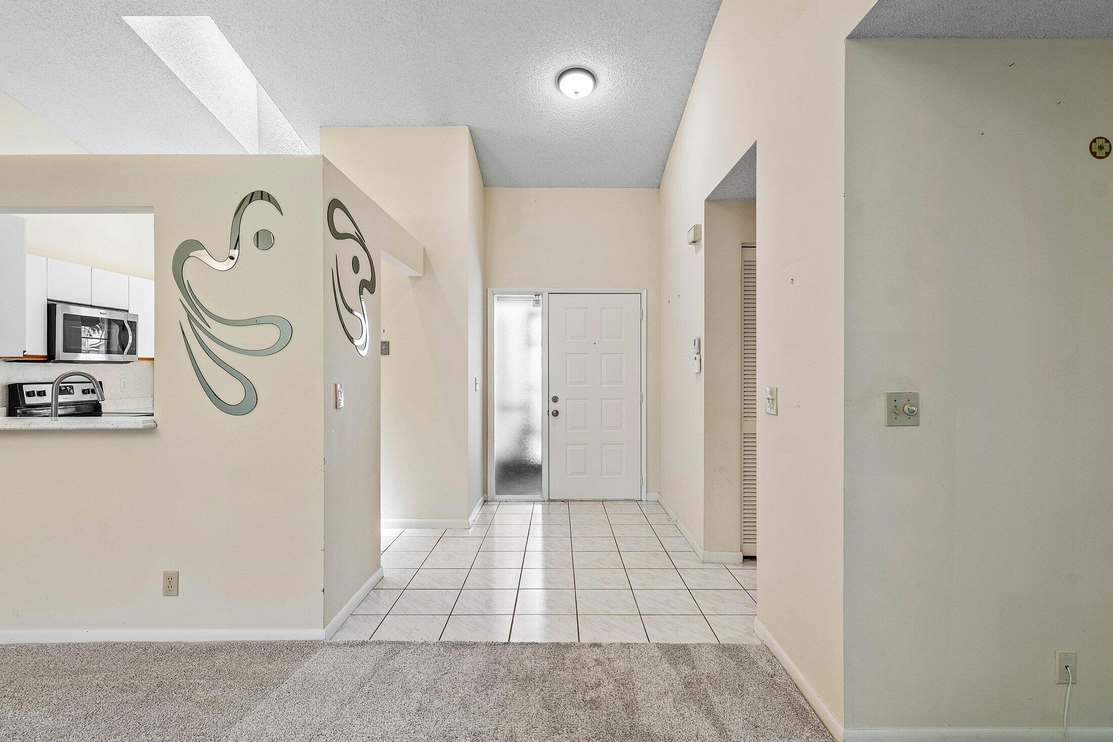 8302 Summersong Terrace, Unit A Boca Raton, FL 33496 - Photo 6 of 43 FOYER