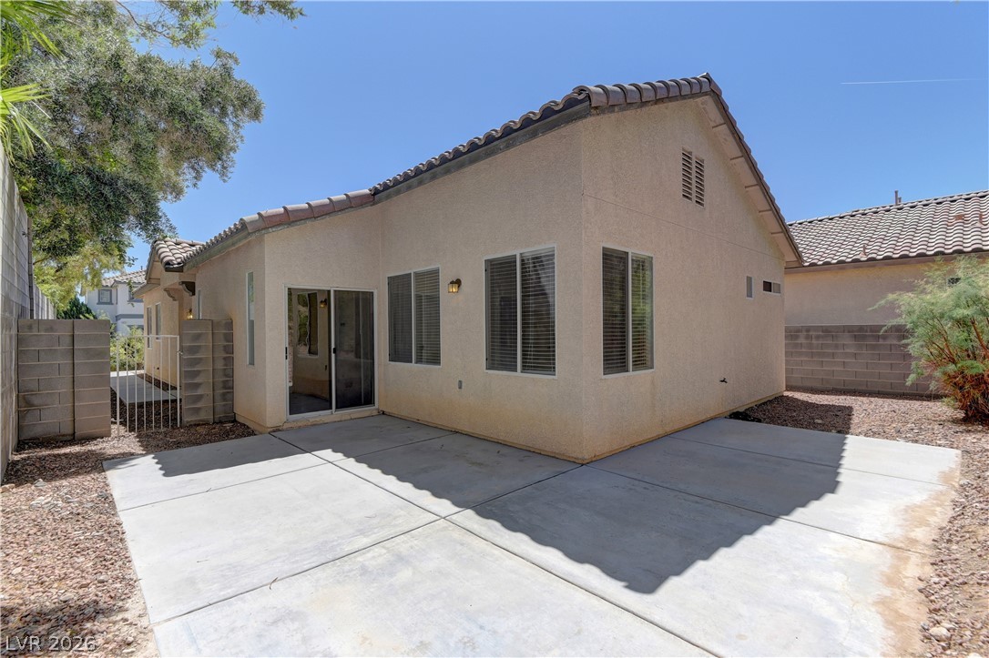 4613 Rising Cove Street Las Vegas, NV 89129 - Photo 17 of 20 This private patio offers a perfect outdoor space for relaxation and enjoyment.