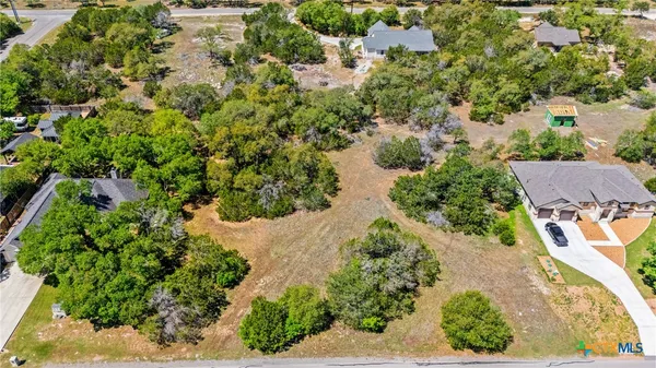 view of a house with a tree