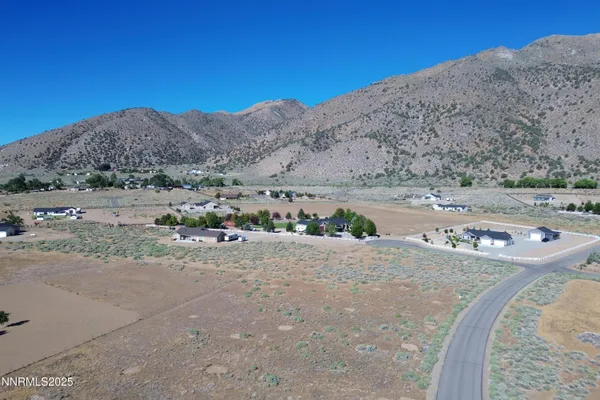 front view of a house with a mountain view
