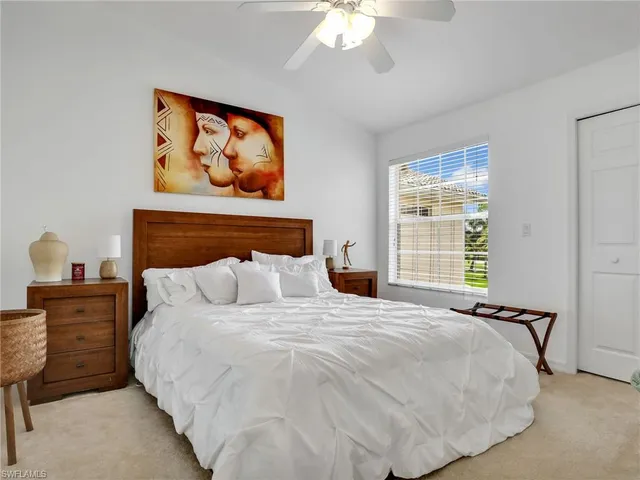 a spacious bathroom with a sink and a mirror