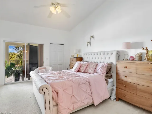 a bathroom with a sink a large mirror and a shower