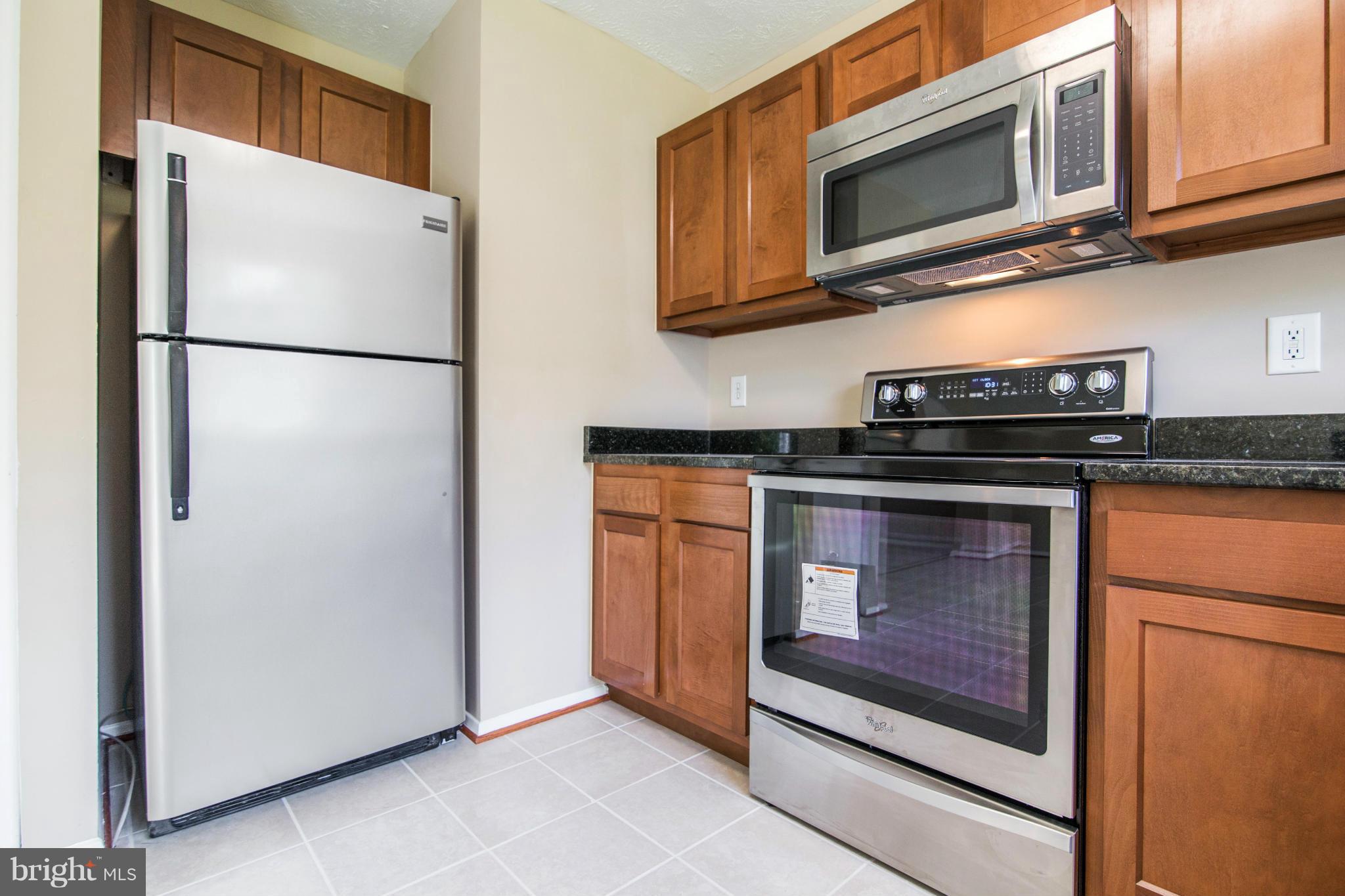 8013 Pine Ridge Road Pasadena, MD 21122 - Photo 11 of 30 Brand new stainless appliances