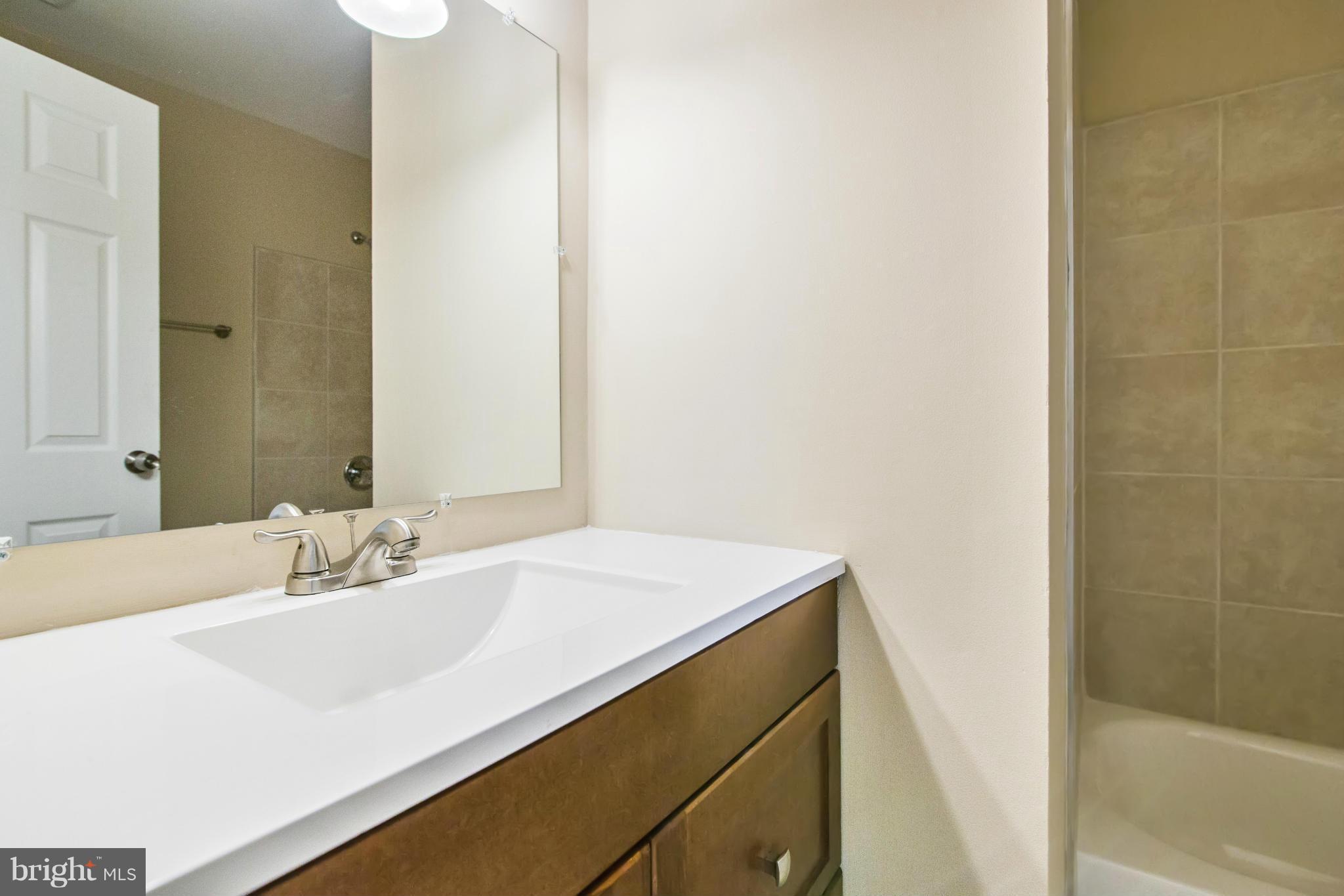 8013 Pine Ridge Road Pasadena, MD 21122 - Photo 14 of 30 Main level Full Bath