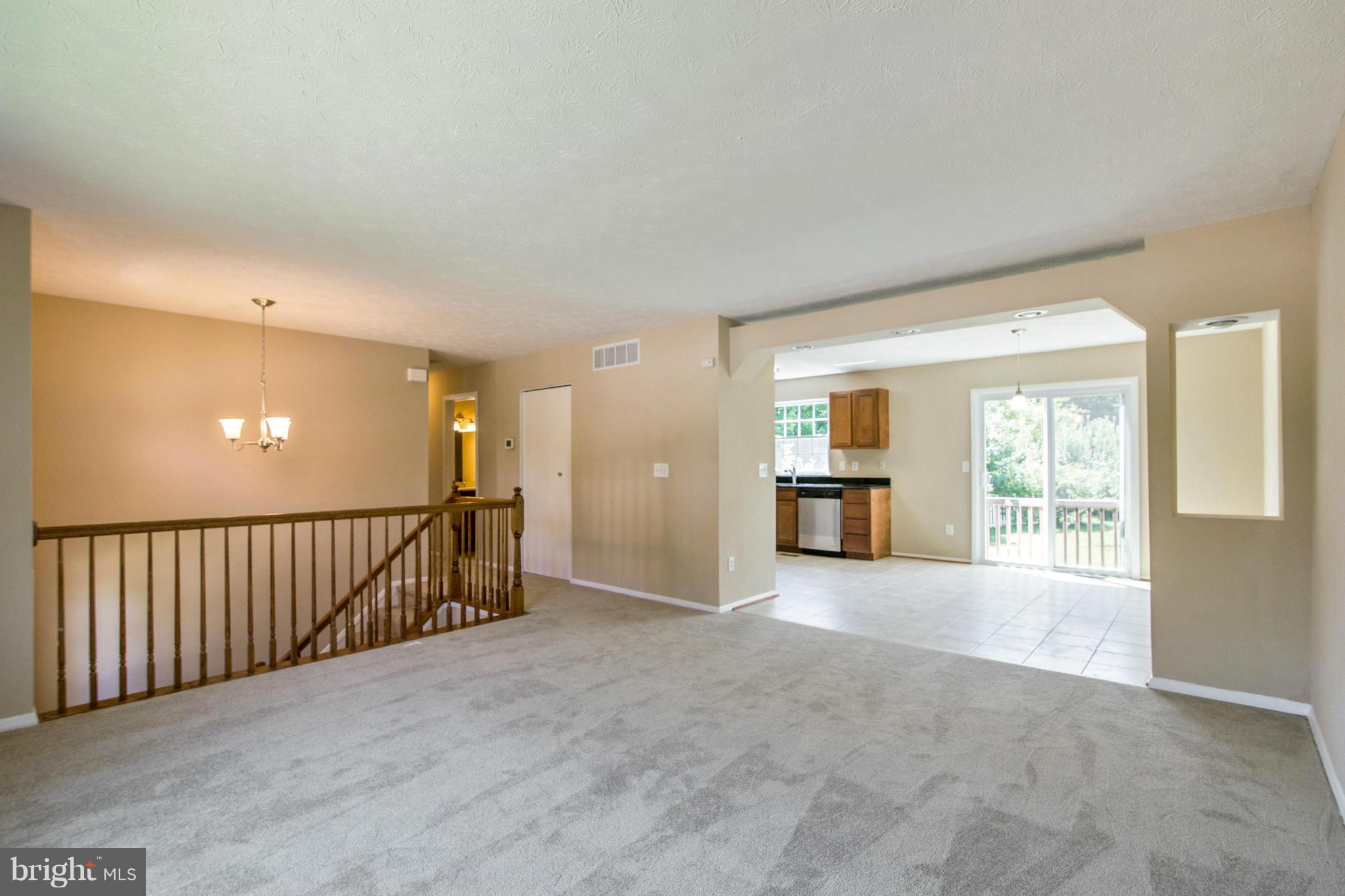 Living Room opens to Eat-in-Kitchen