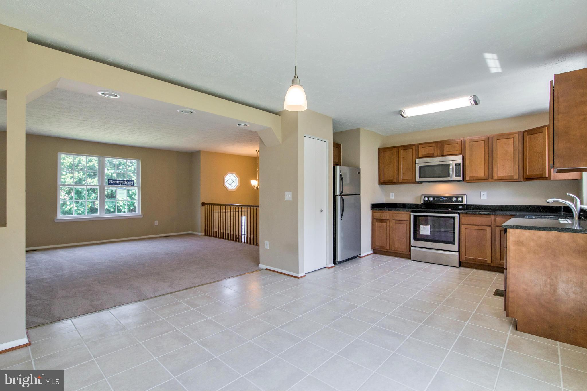 8013 Pine Ridge Road Pasadena, MD 21122 - Photo 9 of 30 Open feel perfect for entertaining!