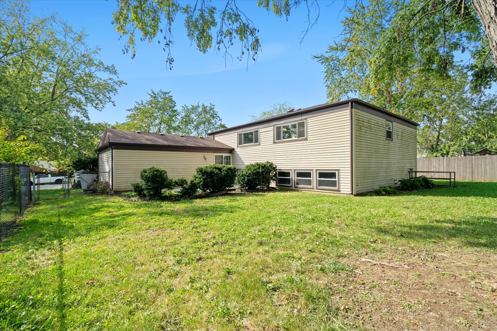 446 Rockhurst Road Bolingbrook, IL 60440 - Photo 29 of 32 a view of a house with a backyard