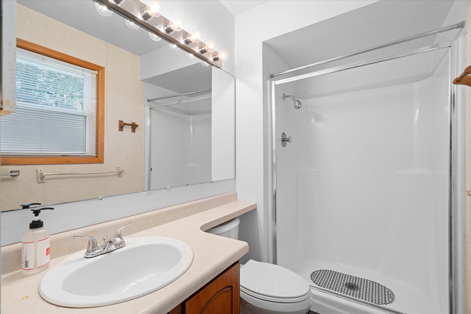446 Rockhurst Road Bolingbrook, IL 60440 - Photo 8 of 32 a bathroom with a sink a toilet and shower