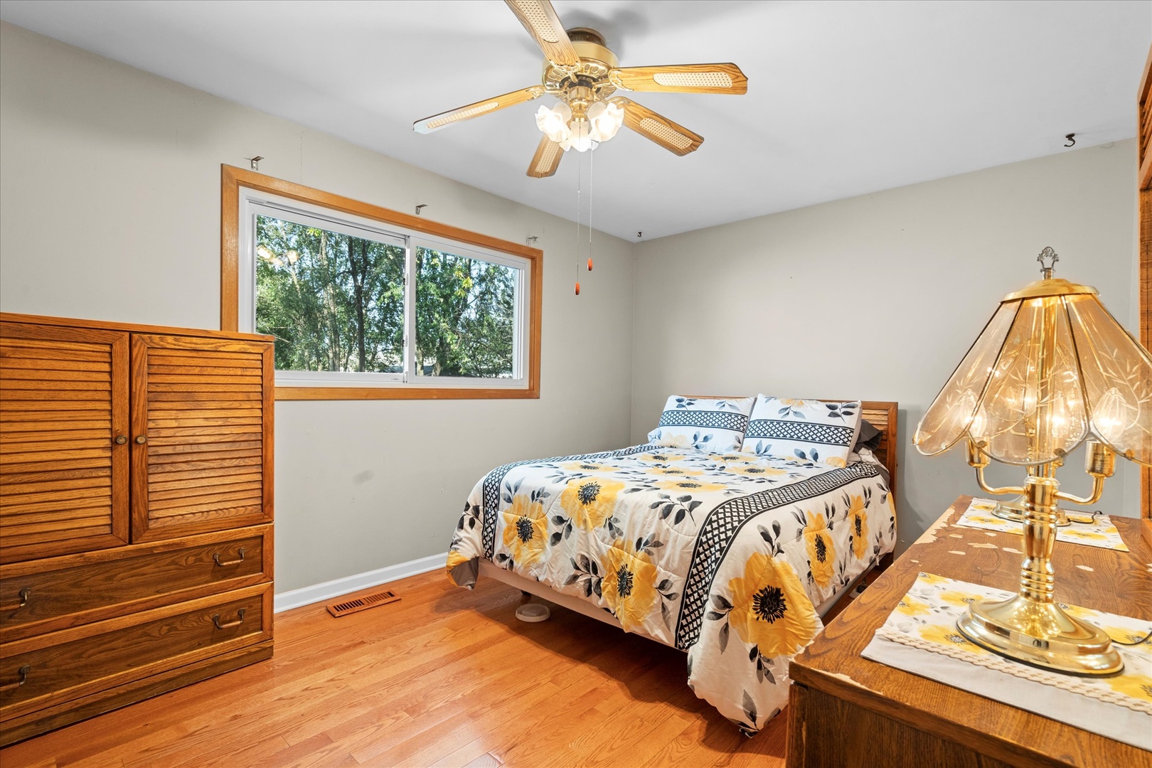 446 Rockhurst Road Bolingbrook, IL 60440 - Photo 9 of 32 a bedroom with a bed and a chandelier