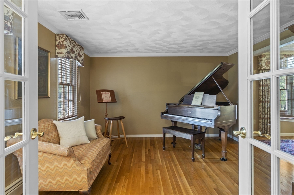 265 B Washington Street Boxford, MA 01921 - Photo 20 of 42 a living room with furniture and a wooden floor