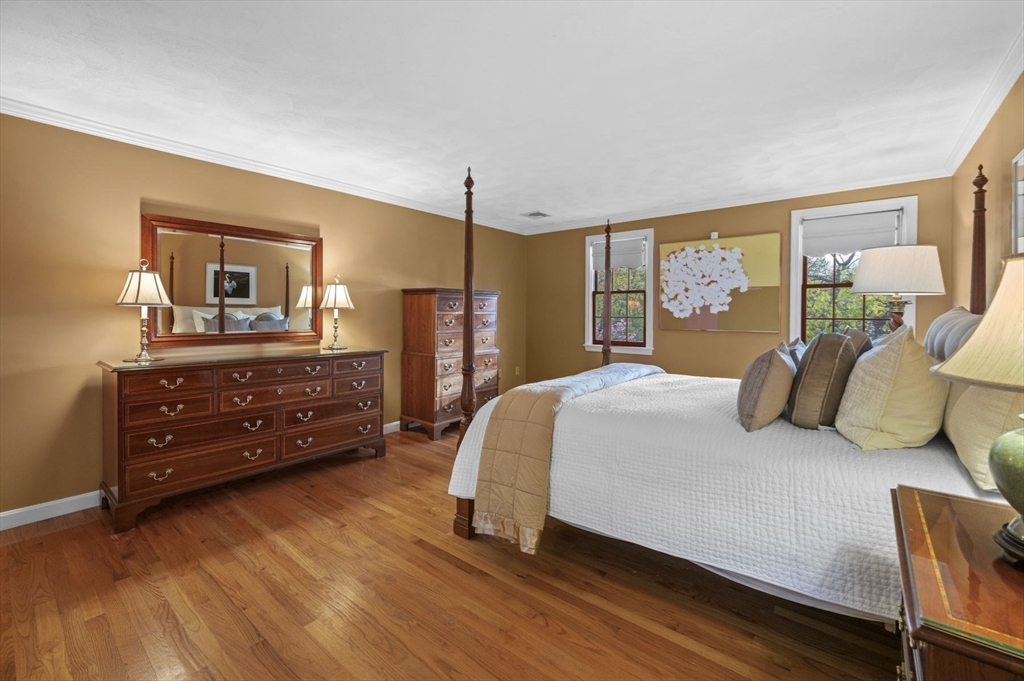 265 B Washington Street Boxford, MA 01921 - Photo 26 of 42 a bedroom with a bed and a dresser