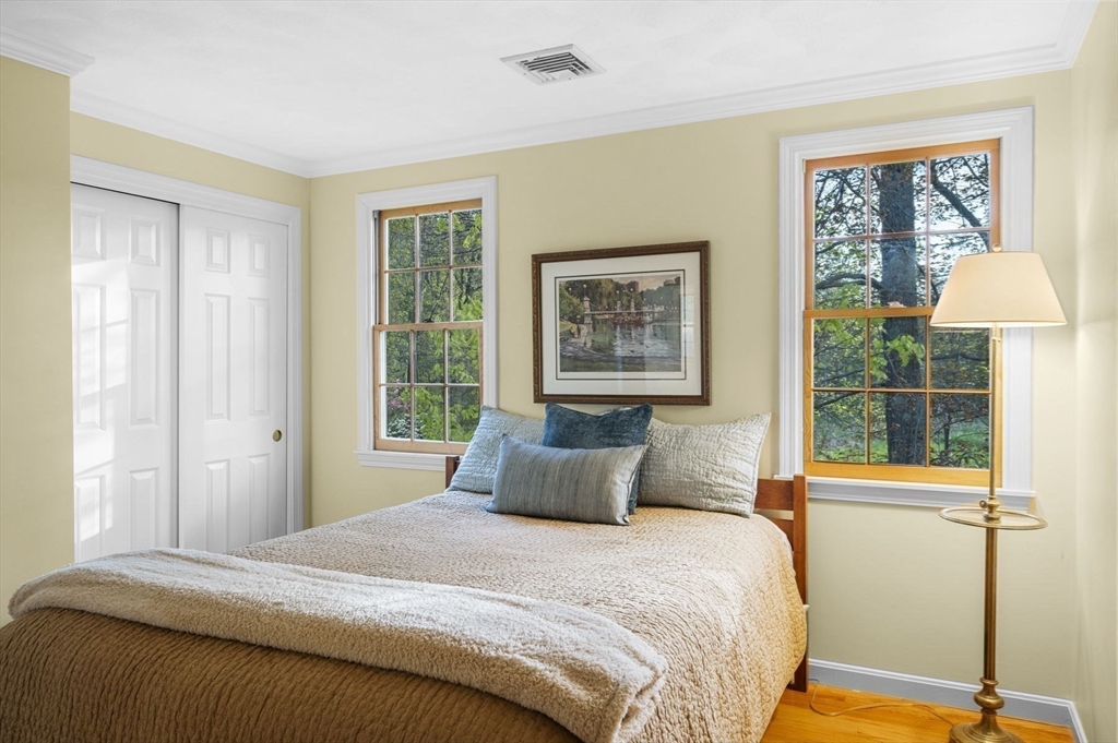 265 B Washington Street Boxford, MA 01921 - Photo 29 of 42 a bedroom with a bed and a window