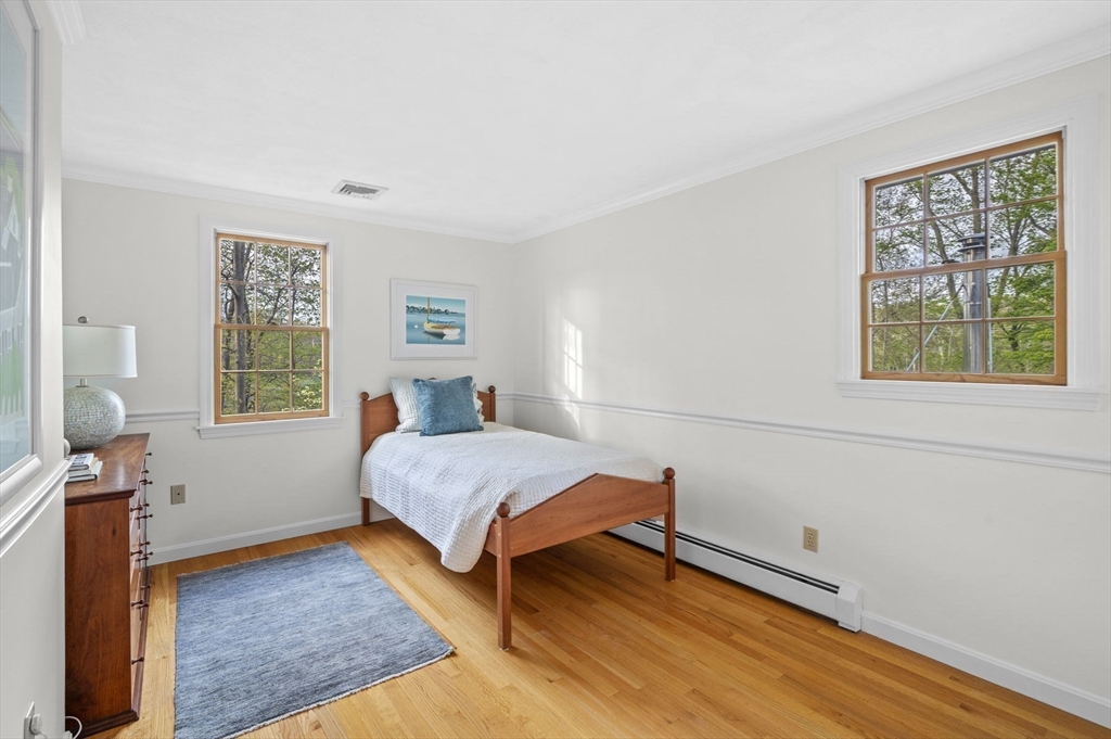 265 B Washington Street Boxford, MA 01921 - Photo 34 of 42 a bedroom with a bed and a window