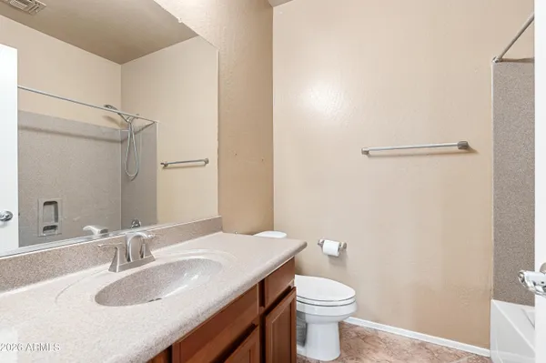 a bathroom with a sink and a toilet