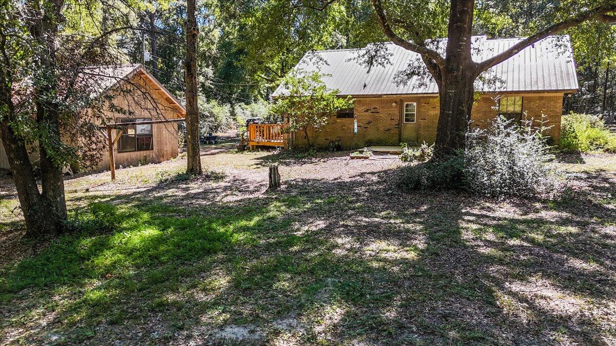 5351 Highway 4 Baker, FL 32531 - Photo 3 of 9 a view of house with yard in front of it