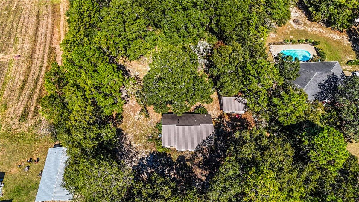 5351 Highway 4 Baker, FL 32531 - Photo 5 of 9 an aerial view of a house with a yard and swimming pool