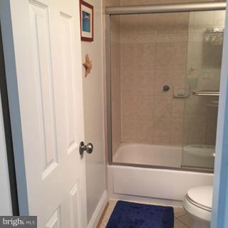 3100 South Manchester Street, Unit 727 Falls Church, VA 22044 - Photo 15 of 23 a bathroom with a shower a toilet and a shower