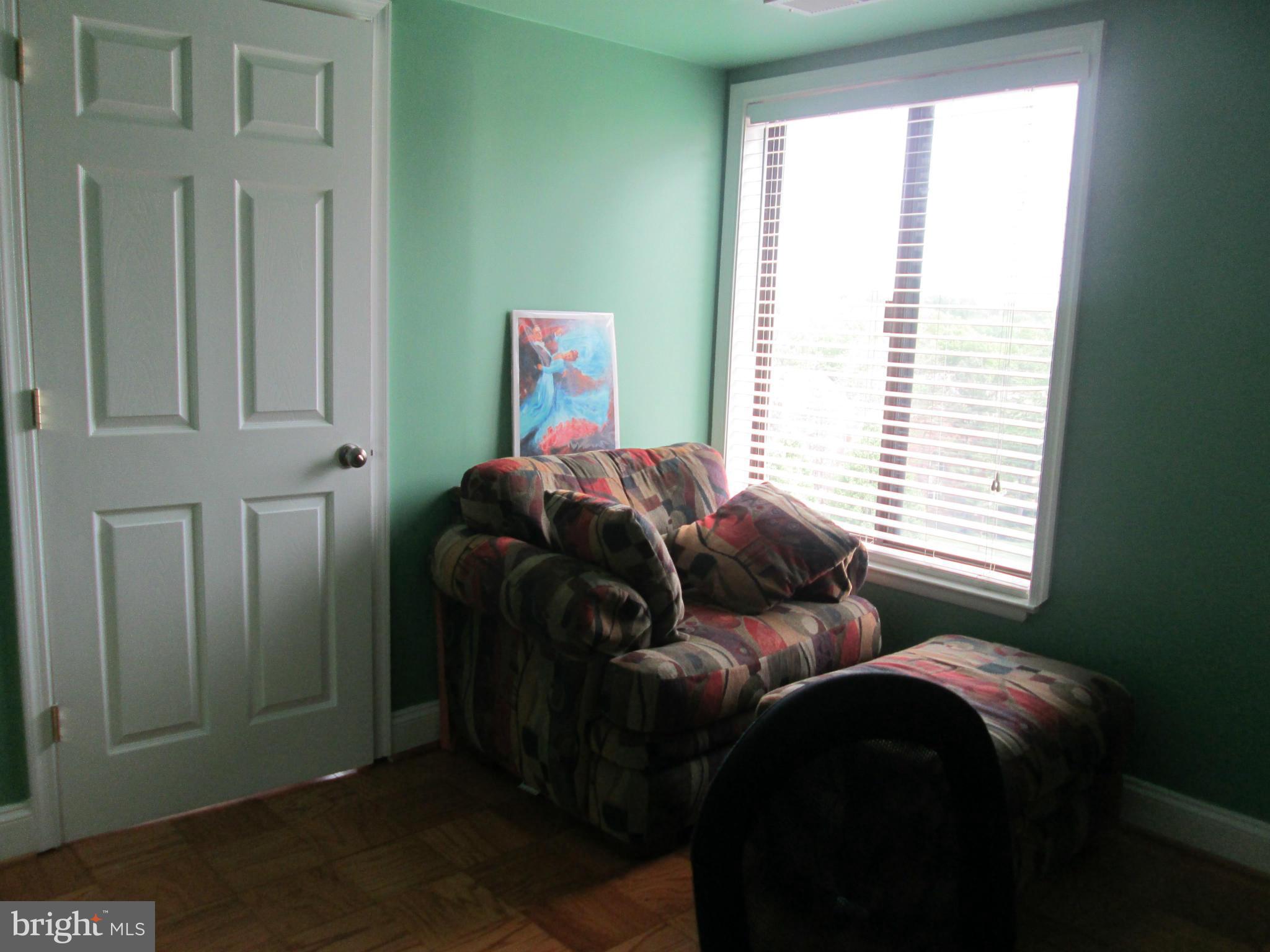 3100 South Manchester Street, Unit 727 Falls Church, VA 22044 - Photo 17 of 23 a living room with furniture and a window