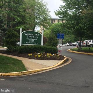 3100 South Manchester Street, Unit 727 Falls Church, VA 22044 - Photo 20 of 23 a view of a park that has a sign board