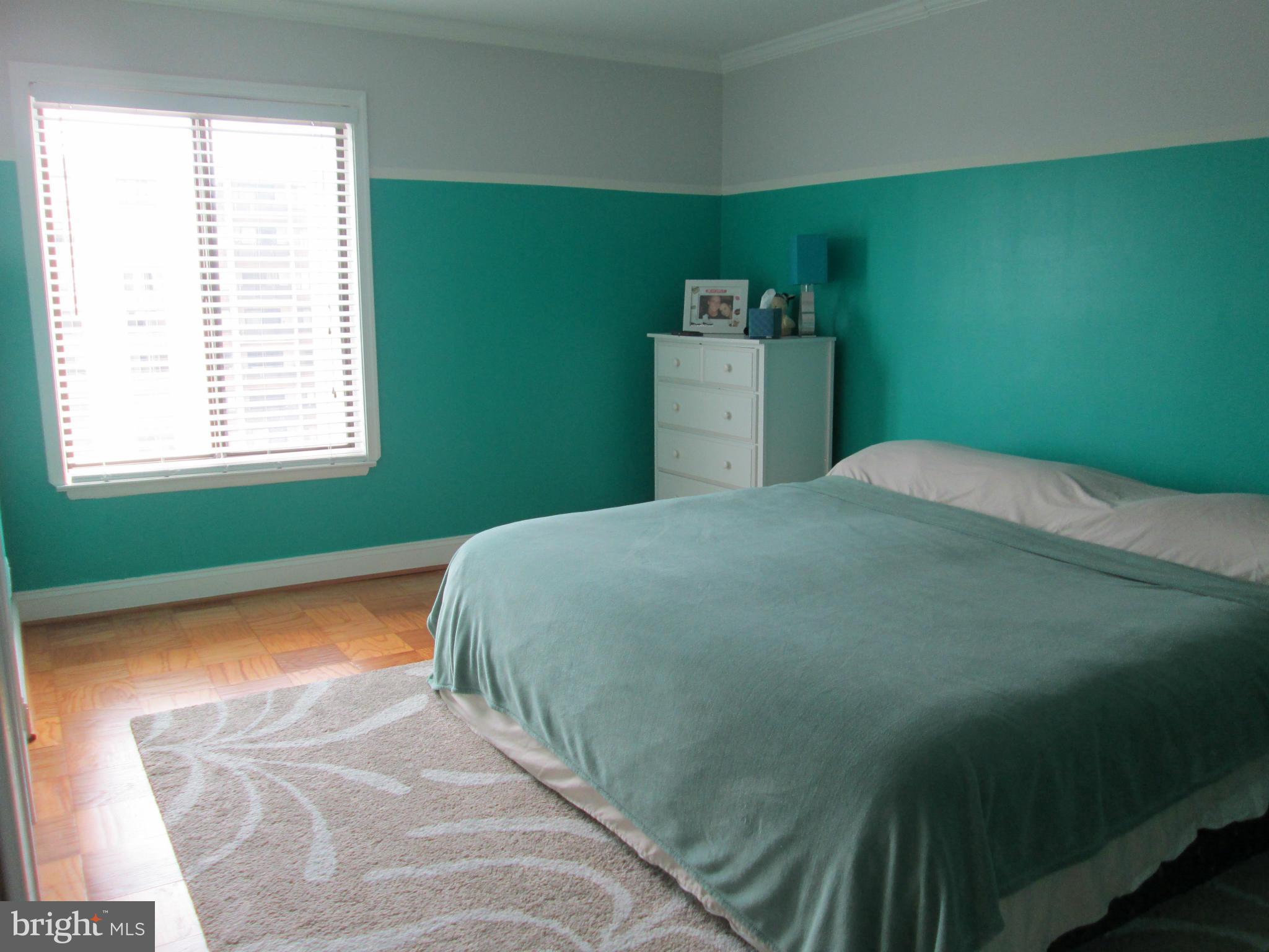 3100 South Manchester Street, Unit 727 Falls Church, VA 22044 - Photo 10 of 23 a bedroom with a bed and window