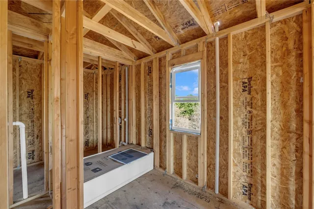 a view of an empty room with stairs