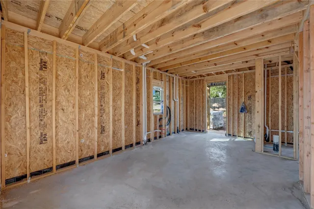 a view of an outdoor space with wooden deck