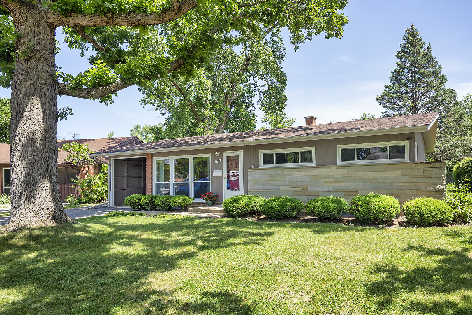 1001 Longaker Road Northbrook, IL 60062 - Photo 1 of 17 a view of a house with backyard and garden