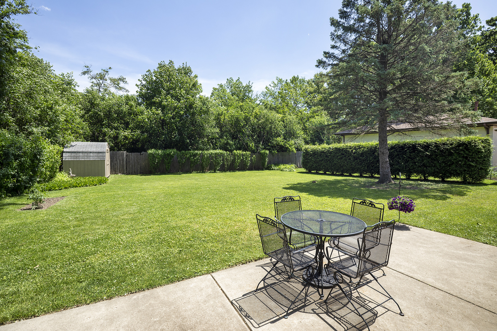 1001 Longaker Road Northbrook, IL 60062 - Photo 15 of 17 a view of a chair and table on the garden