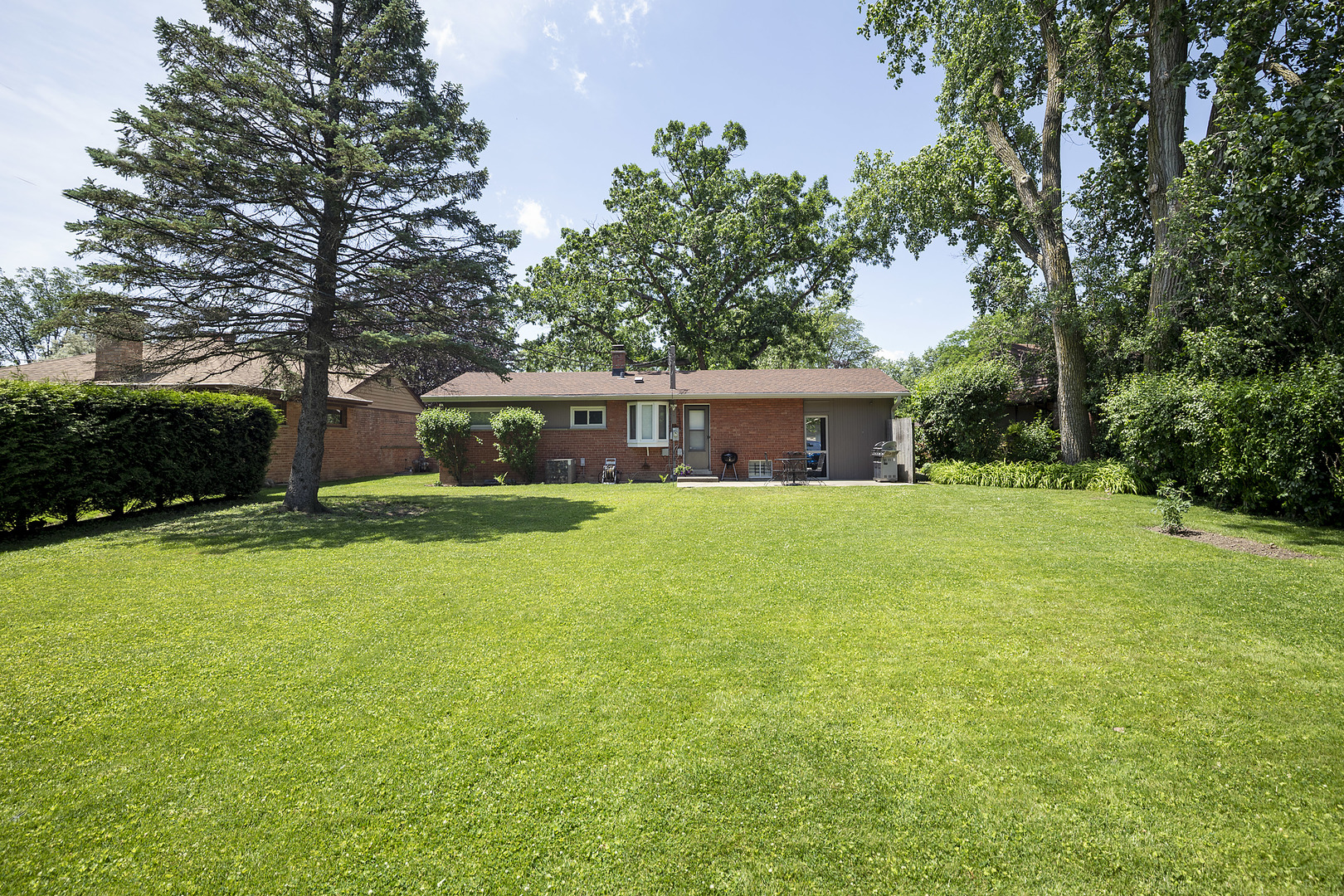 1001 Longaker Road Northbrook, IL 60062 - Photo 17 of 17 a front view of house with yard and green space