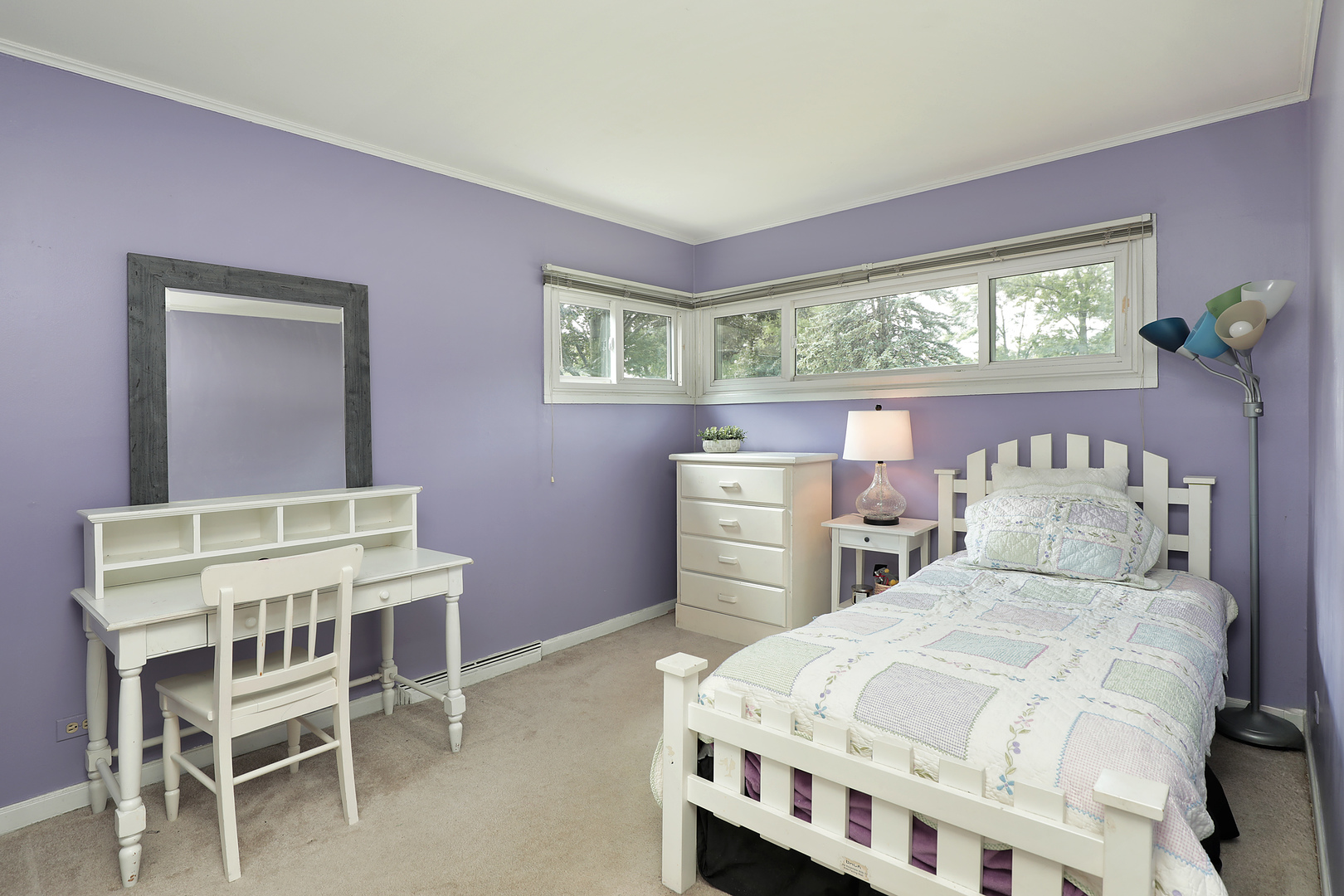 1001 Longaker Road Northbrook, IL 60062 - Photo 9 of 17 a bedroom with a bed and a table