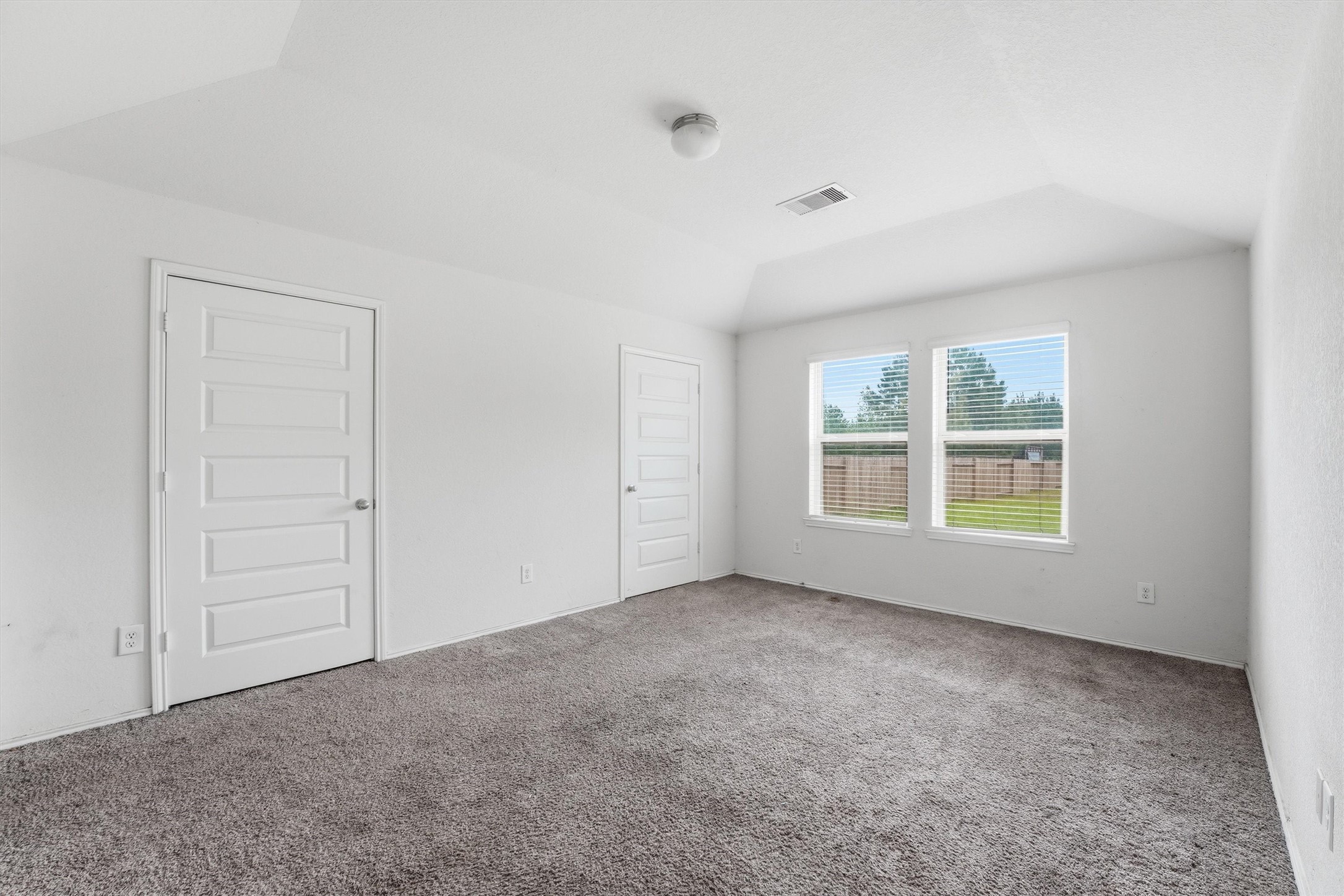 1634 Road 5102 Cleveland, TX 77327 - Photo 12 of 21 a view of an empty room with a window