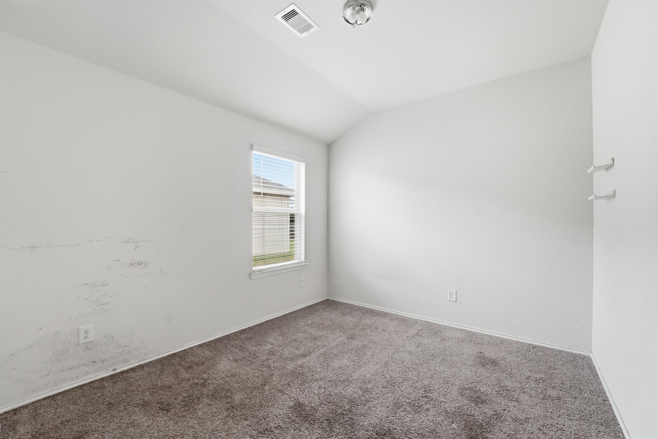 1634 Road 5102 Cleveland, TX 77327 - Photo 17 of 21 an empty room with windows