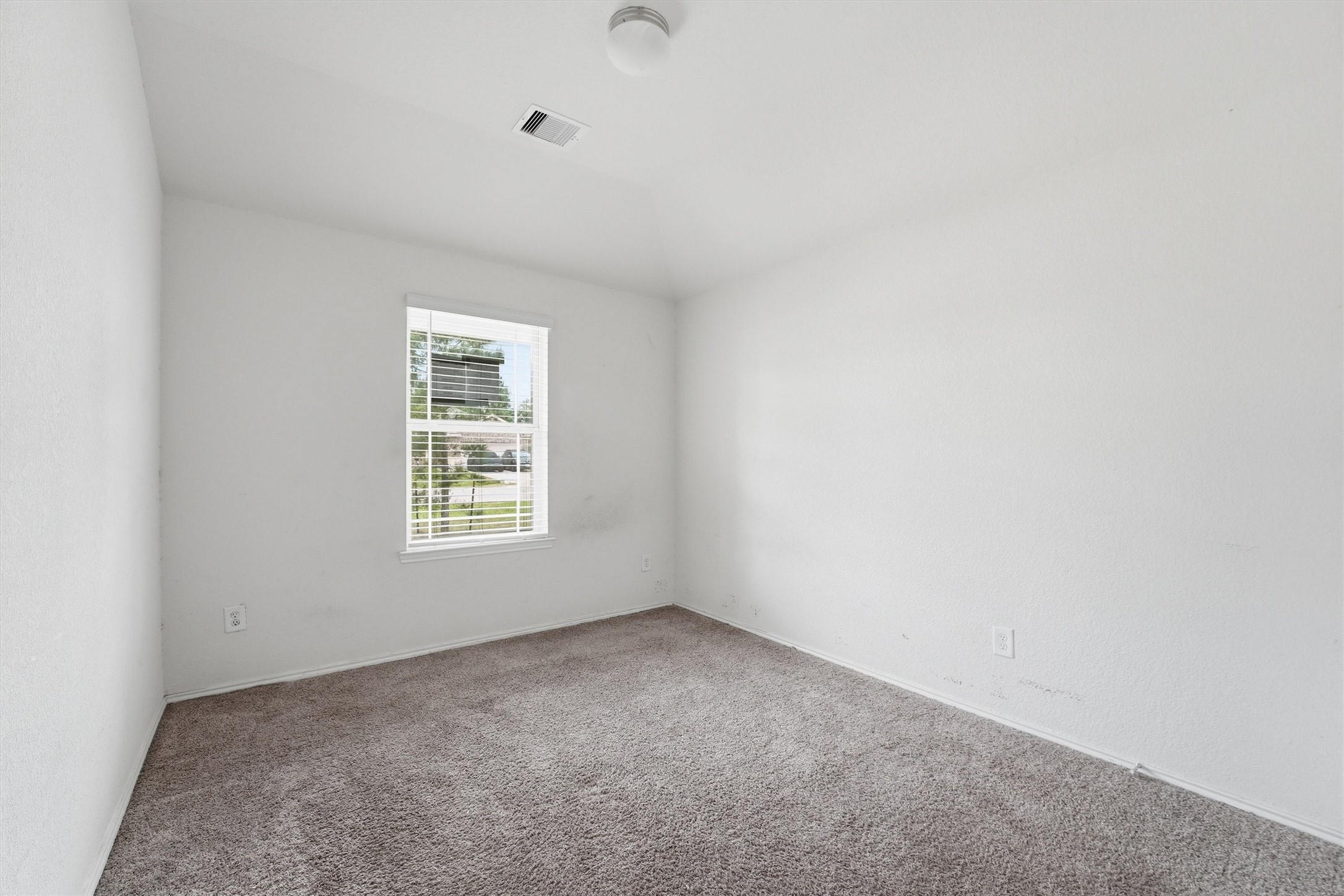 1634 Road 5102 Cleveland, TX 77327 - Photo 18 of 21 an empty room with a window