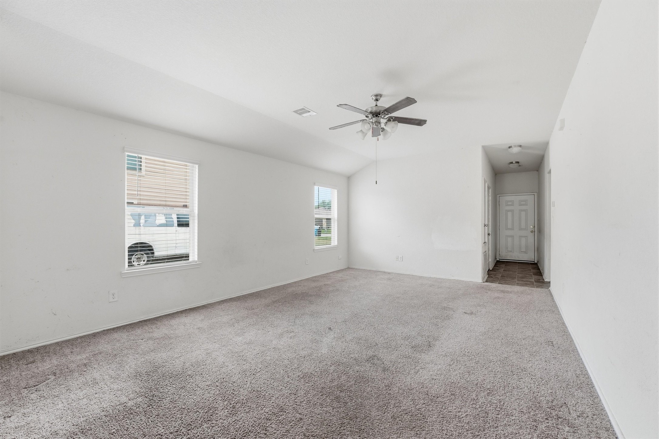 1634 Road 5102 Cleveland, TX 77327 - Photo 6 of 21 a view of an empty room with a window