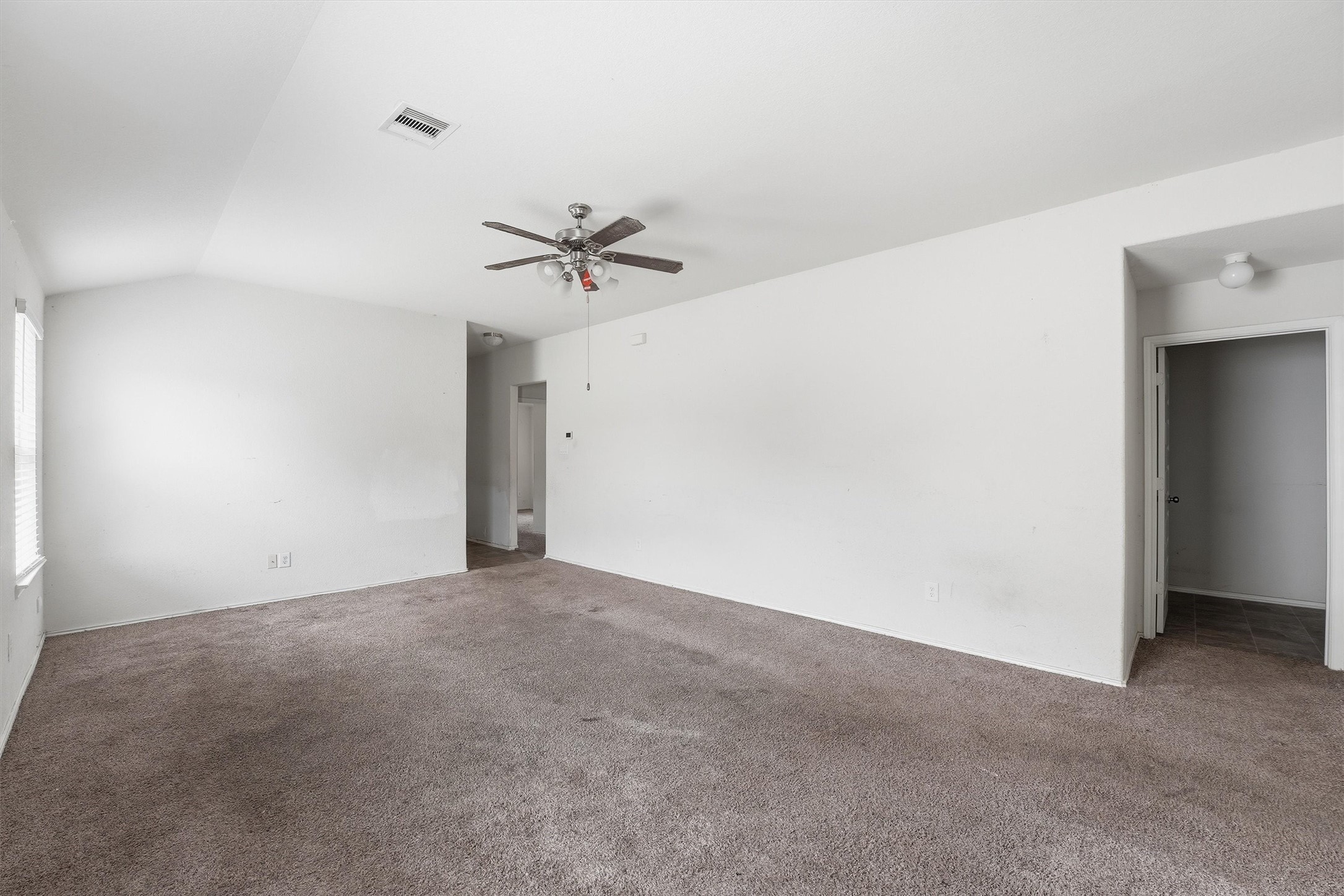 1634 Road 5102 Cleveland, TX 77327 - Photo 7 of 21 a view of an empty room with a window