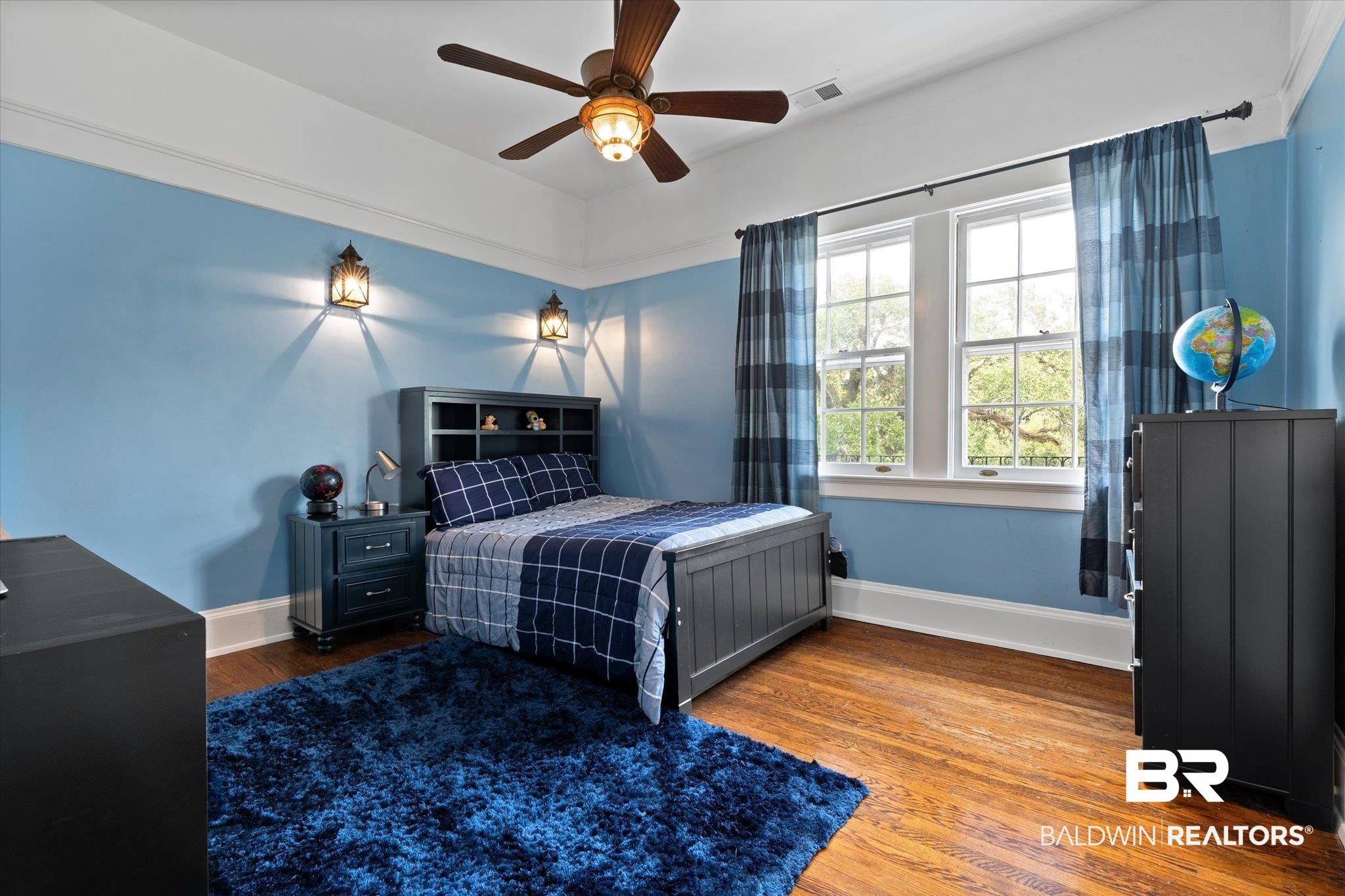 1953 Dauphin Street Mobile, AL 36606 - Photo 22 of 56 Bedroom featuring wood-type flooring and ceiling fan