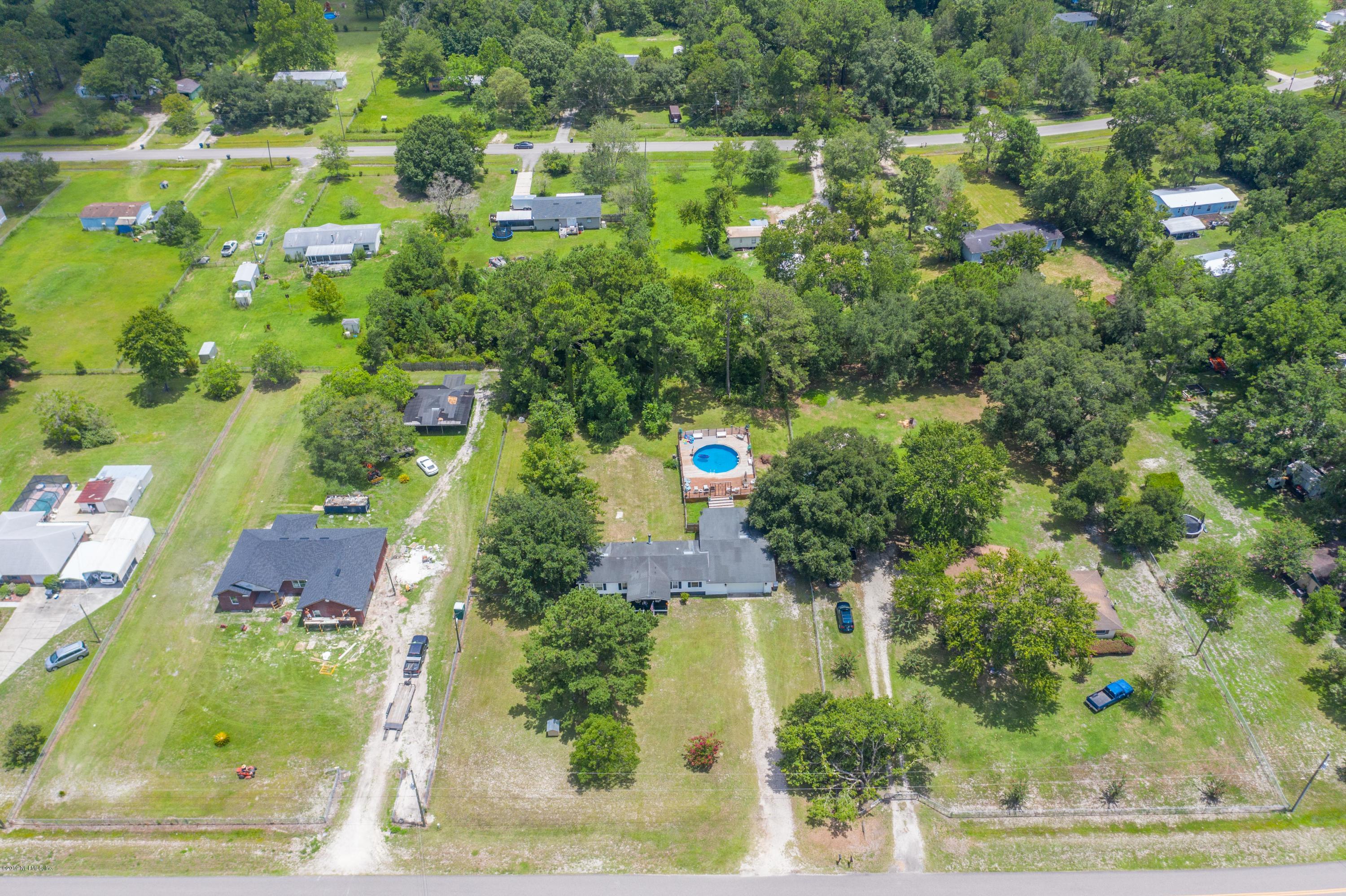 54256 Dornbush Road Callahan, FL 32011 - Photo 60 of 60 an aerial view of residential houses with outdoor space and street view