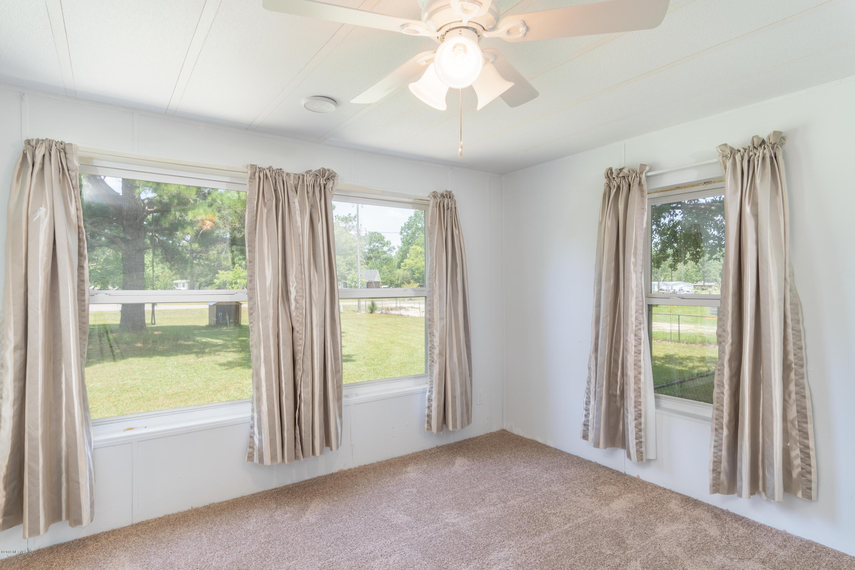 54256 Dornbush Road Callahan, FL 32011 - Photo 8 of 60 a view of an empty room with a window