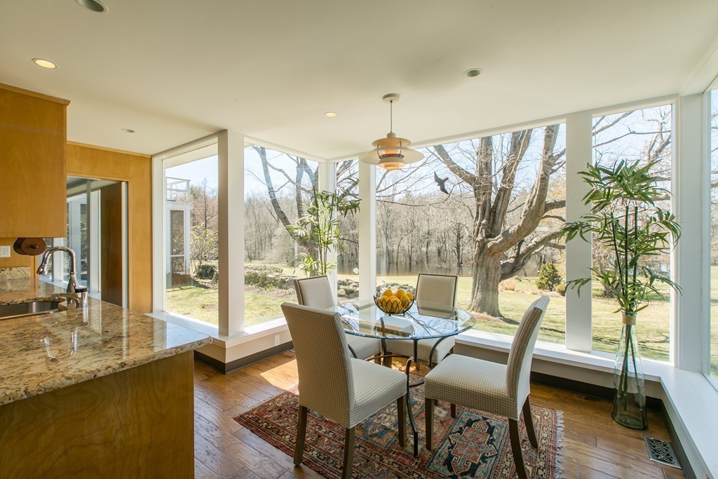 111 Barretts Mill Road Concord, MA 01742 - Photo 11 of 29 a view of a dining room with furniture window and outside view