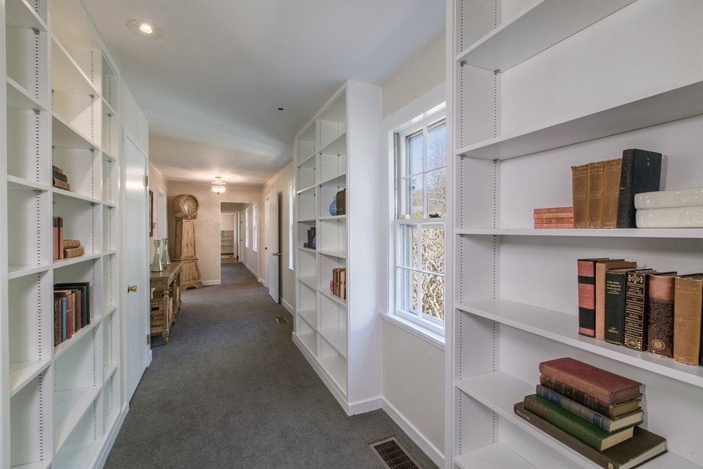 111 Barretts Mill Road Concord, MA 01742 - Photo 14 of 29 a hallway with cabinets