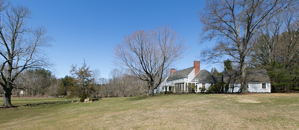 111 Barretts Mill Road Concord, MA 01742 - Photo 22 of 29 a front view of a house with a yard