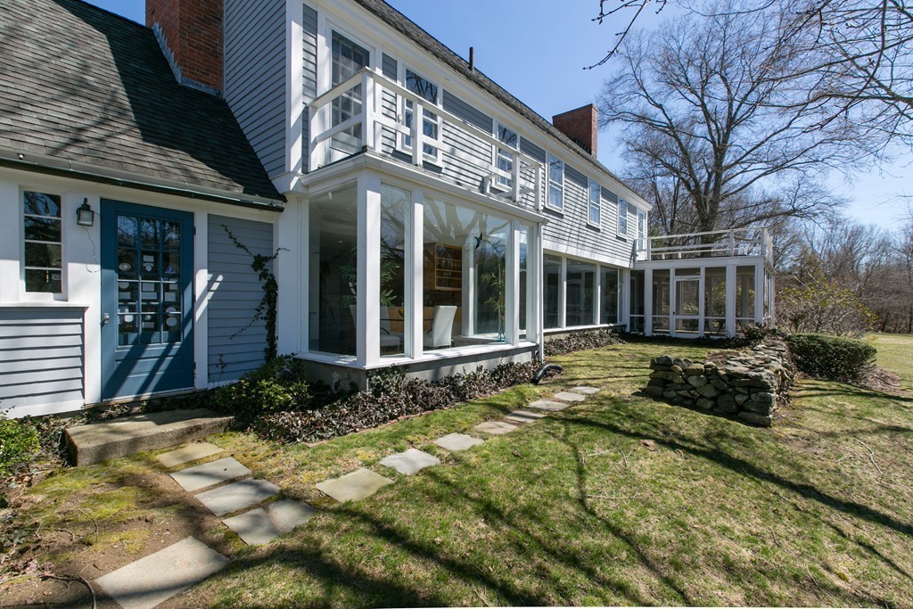 111 Barretts Mill Road Concord, MA 01742 - Photo 24 of 29 a view of a building with a yard